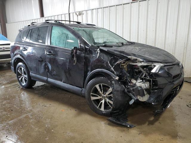 Photo 4 from auction – 2016 TOYOTA RAV4 XLE with VIN 2T3RFREV0GW477743