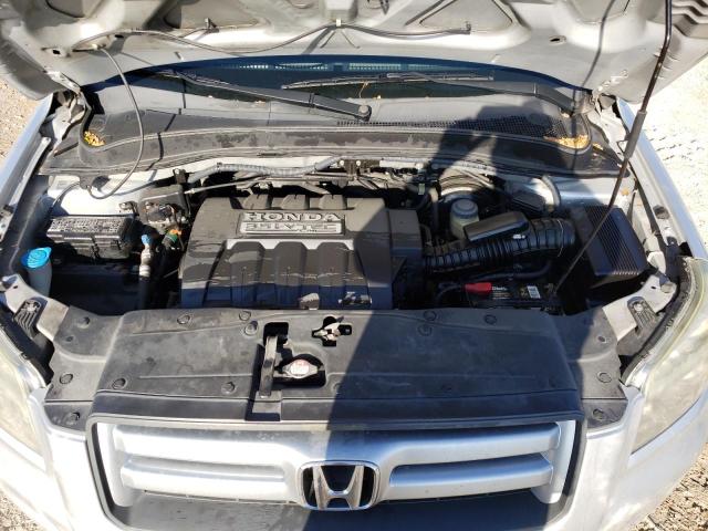 Photo 12 from auction – 2006 HONDA PILOT EX with VIN 5FNYF28506B046077