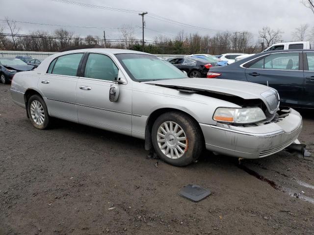 Photo 4 from auction – 2004 LINCOLN TOWN CAR E with VIN 1LNHM81W44Y619597