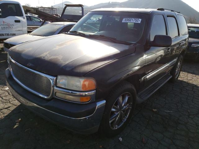 GMC YUKON 2003 with VIN 1GKEC13V63R277461 - Photo from auction