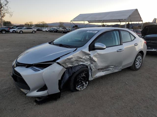 TOYOTA COROLLA L 2017 with VIN 5YFBURHE7HP713531 - Photo from auction