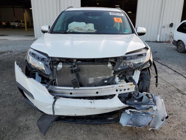 Photo 5 from auction – 2021 HONDA PILOT SE with VIN 5FNYF5H23MB026166