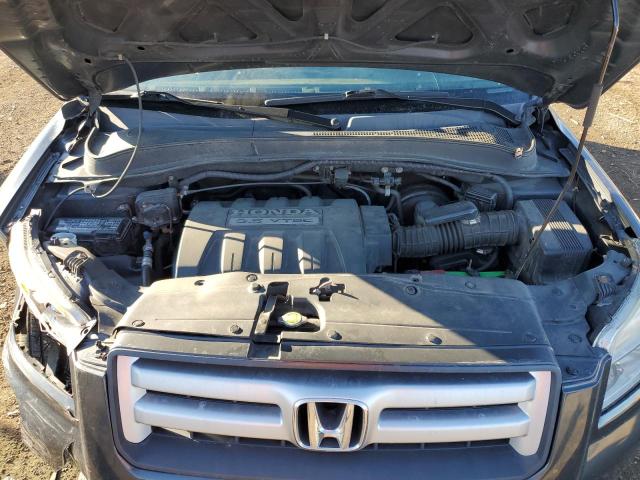 Photo 12 from auction – 2006 HONDA PILOT EX with VIN 2HKYF18446H540591