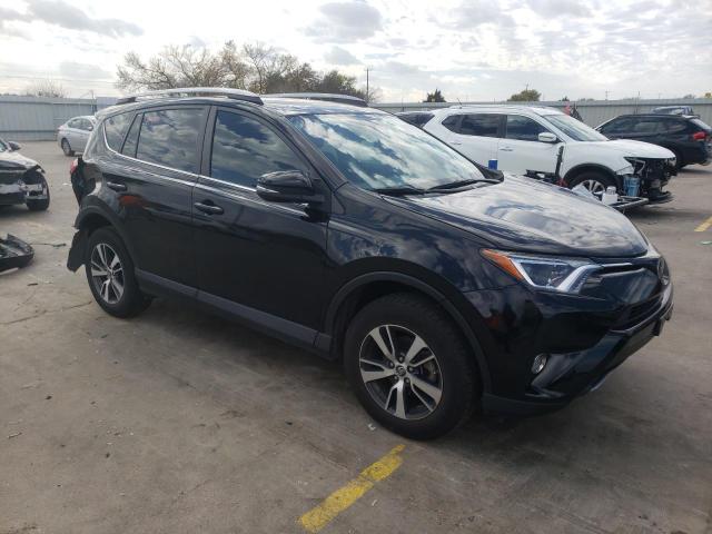 Photo 4 from auction – 2017 TOYOTA RAV4 XLE with VIN 2T3WFREV6HW353965