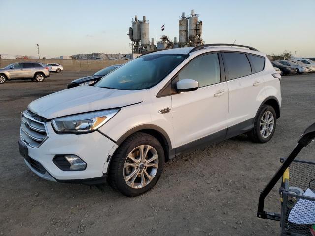 FORD ESCAPE SE 2018 with VIN 1FMCU0GD1JUC90779 - Photo from auction