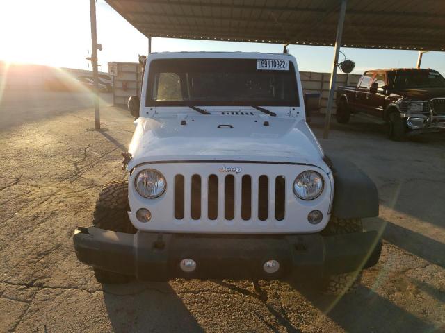 Photo 5 from auction – 2016 JEEP WRANGLER U with VIN 1C4BJWFG5GL271125