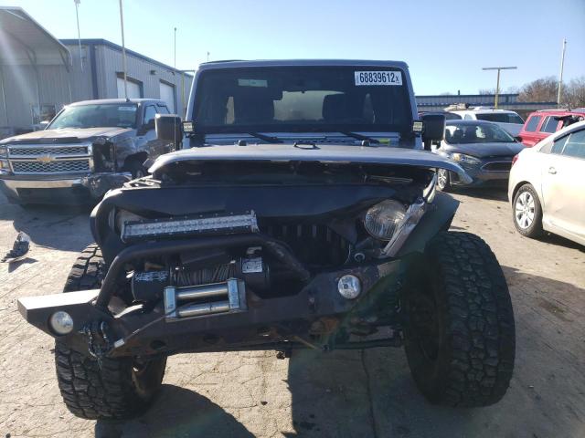 Photo 5 from auction – 2013 JEEP WRANGLER U with VIN 1C4BJWDG4DL581474
