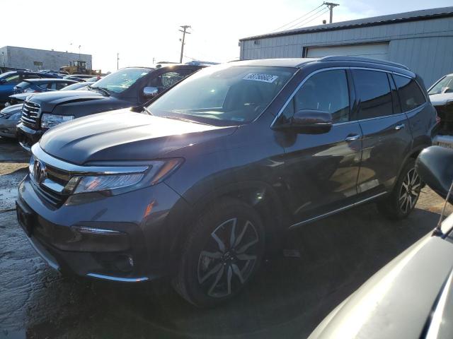 HONDA PILOT TOUR 2022 with VIN 5FNYF6H60NB021274 - Photo from auction