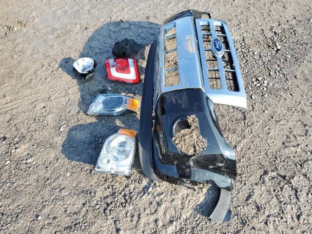 Photo 13 from auction – 2011 FORD ESCAPE LIM with VIN 1FMCU0E72BKA36704