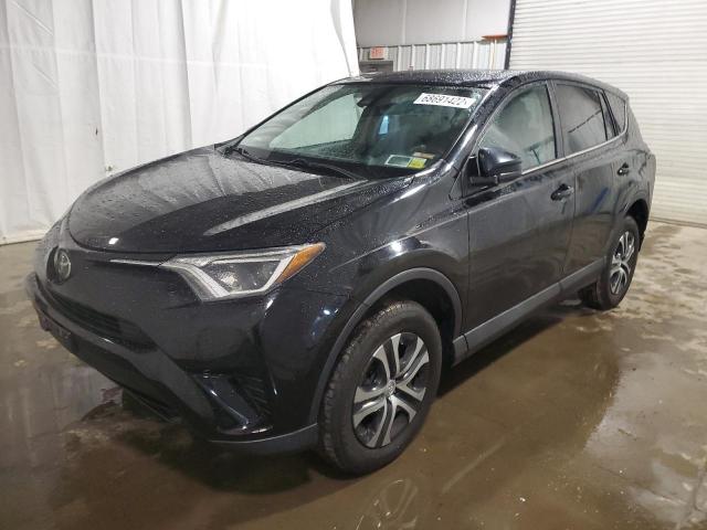 TOYOTA RAV4 LE 2018 with VIN 2T3ZFREV1JW506559 - Photo from auction