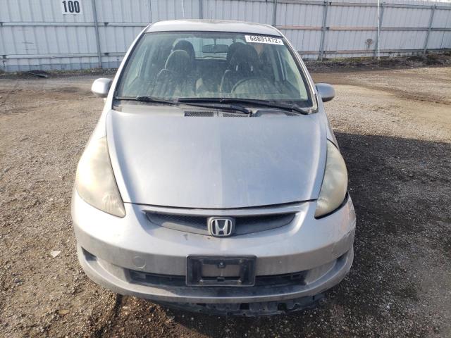 Photo 5 from auction – 2007 HONDA FIT with VIN JHMGD38427S818841