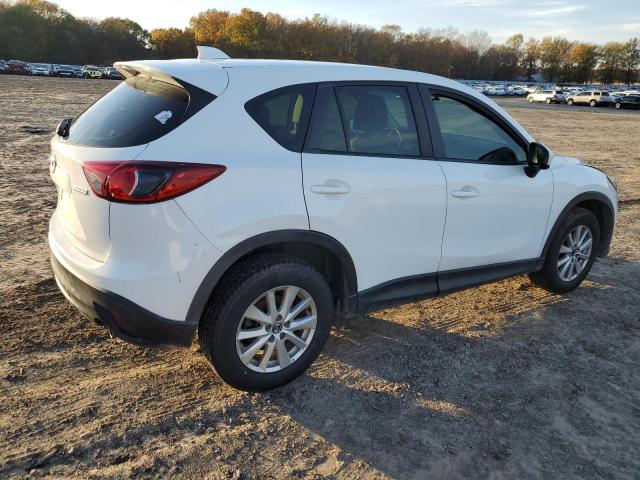 Photo 3 from auction – 2014 MAZDA CX-5 SPORT with VIN JM3KE2BE4E0377041