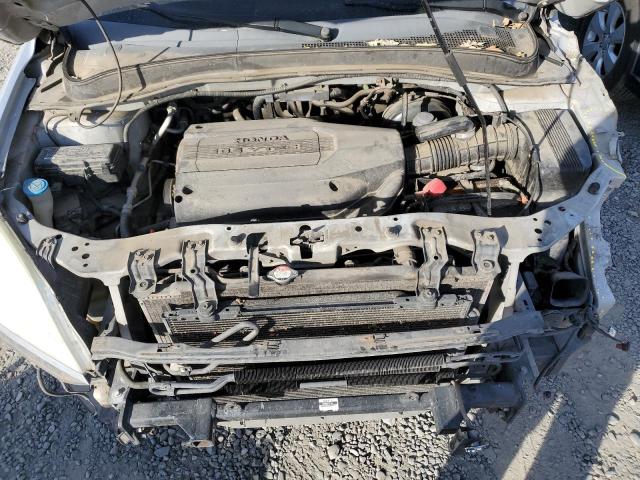 Photo 12 from auction – 2003 HONDA PILOT LX with VIN 2HKYF18133H514839