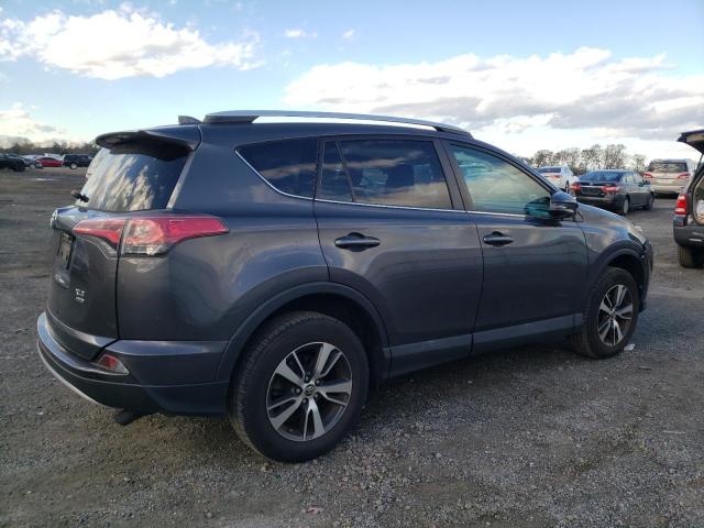 Photo 3 from auction – 2016 TOYOTA RAV4 XLE with VIN 2T3RFREV2GW499727