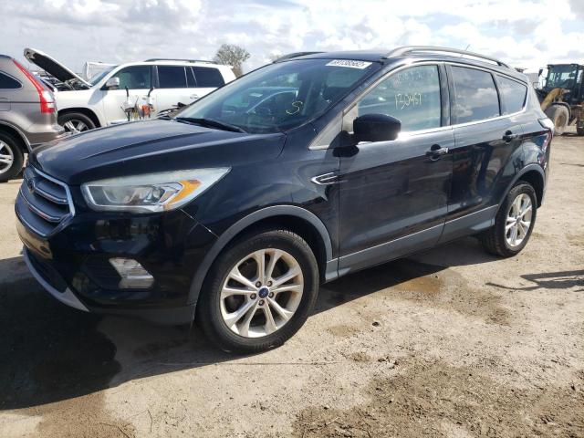 FORD ESCAPE SE 2017 with VIN 1FMCU0GD7HUC96385 - Photo from auction