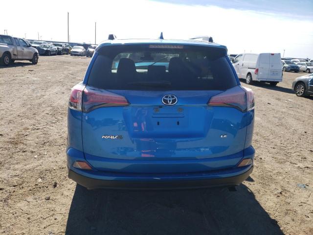 Photo 6 from auction – 2018 TOYOTA RAV4 LE with VIN JTMZFREV4JJ190699