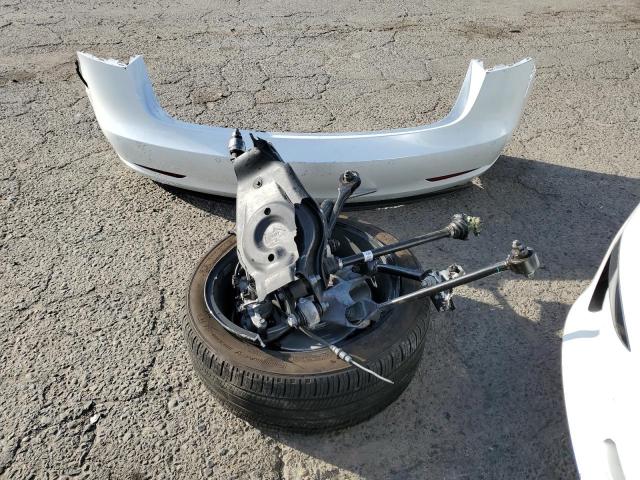 Photo 12 from auction – 2022 TESLA MODEL 3 with VIN 5YJ3E1EBXNF153654