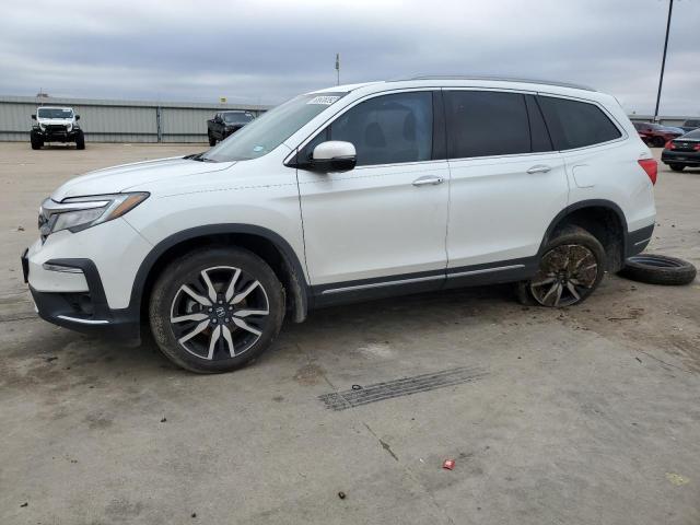 HONDA PILOT ELIT 2020 with VIN 5FNYF6H04LB050625 - Photo from auction