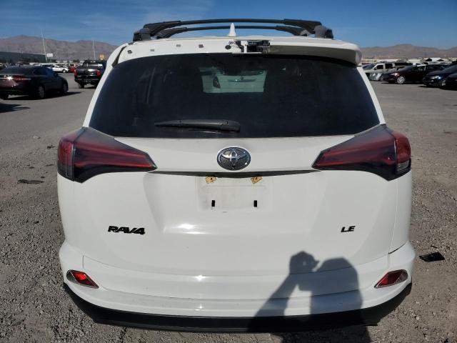 Photo 6 from auction – 2018 TOYOTA RAV4 LE with VIN JTMZFREV7JJ727646