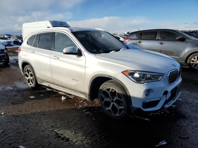 Photo 4 from auction – 2017 BMW X1 XDRIVE2 with VIN WBXHT3C32H5F70927