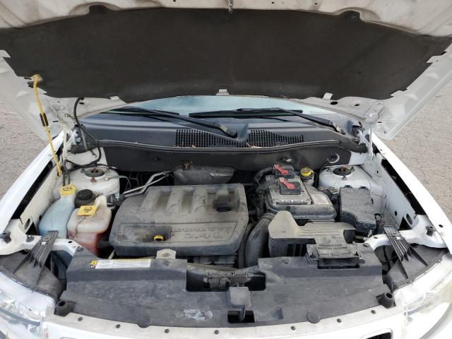 Photo 12 from auction – 2011 JEEP COMPASS SP with VIN 1J4NT1FB6BD242731