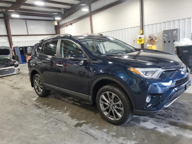 Photo 4 from auction – 2018 TOYOTA RAV4 LIMIT with VIN JTMDFREV7JJ221809