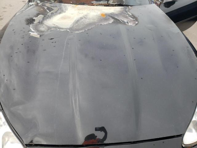 Photo 11 from auction – 2000 JAGUAR XK8 with VIN SAJJA42C8YNA10827