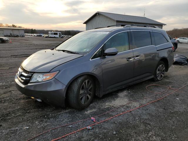 HONDA ODYSSEY TO 2014 with VIN 5FNRL5H93EB094883 - Photo from auction