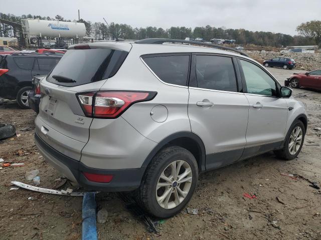 Photo 3 from auction – 2017 FORD ESCAPE SE with VIN 1FMCU0GD3HUC18461