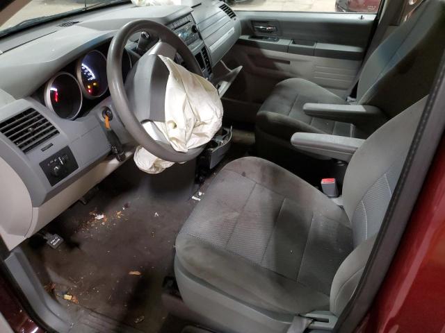 Photo 7 from auction – 2009 DODGE GRAND CARA with VIN 2D8HN44E19R539233