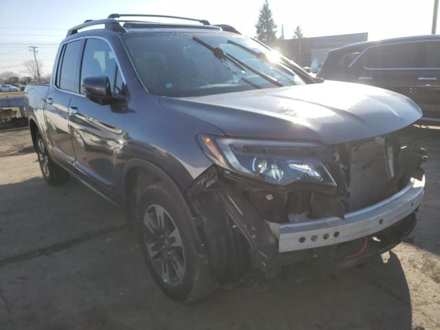 Photo 4 from auction – 2018 HONDA RIDGELINE with VIN 5FPYK3F75JB005966