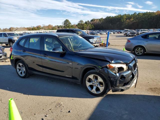 Photo 4 from auction – 2014 BMW X1 SDRIVE2 with VIN WBAVM1C58EVW48295