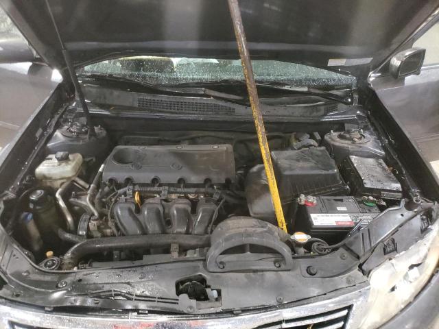 Photo 11 from auction – 2009 KIA OPTIMA LX with VIN KNAGE228795315843