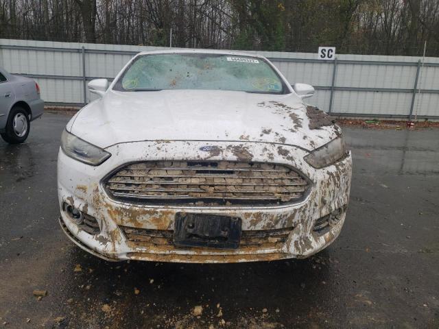 Photo 5 from auction – 2014 FORD FUSION TIT with VIN 3FA6P0D92ER322795