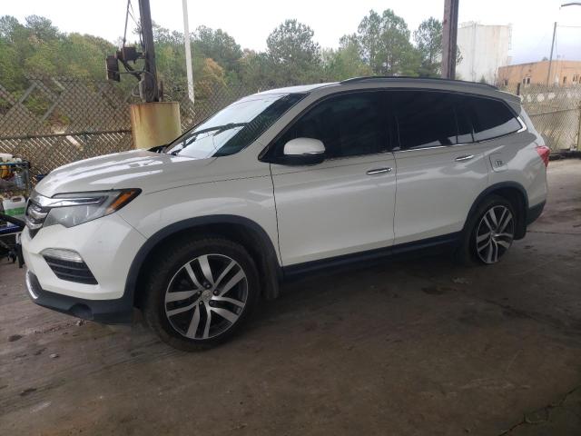 HONDA PILOT ELIT 2017 with VIN 5FNYF6H00HB036258 - Photo from auction