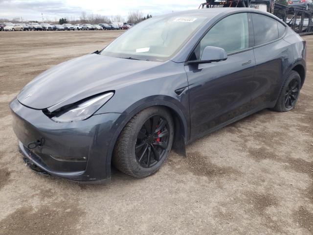 TESLA MODEL Y 2022 with VIN 7SAYGDEF6NF326772 - Photo from auction