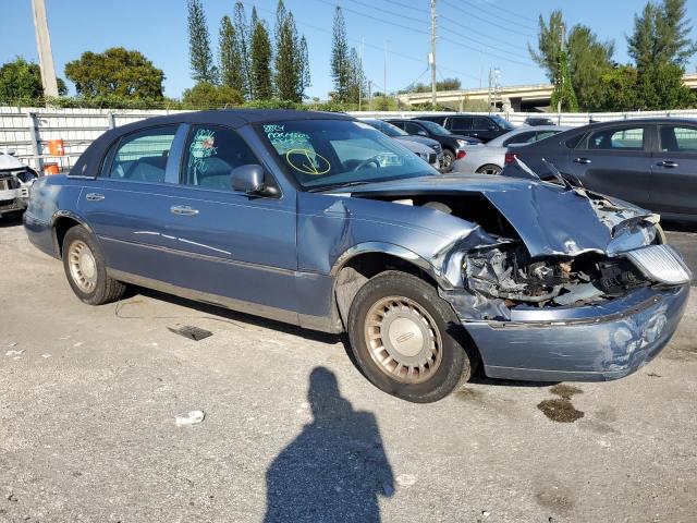 Photo 4 from auction – 2000 LINCOLN TOWN CAR E with VIN 1LNHM81W6YY766414