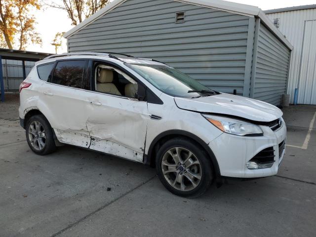 Photo 4 from auction – 2014 FORD ESCAPE TIT with VIN 1FMCU0J97EUD44306