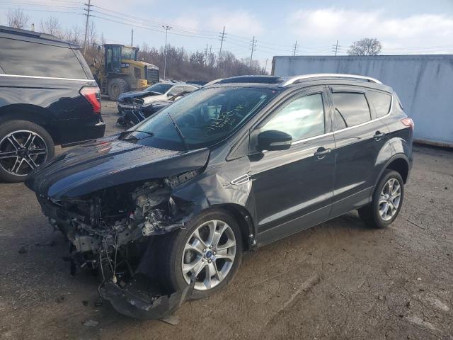 FORD ESCAPE TIT 2014 with VIN 1FMCU0JX2EUC21365 - Photo from auction