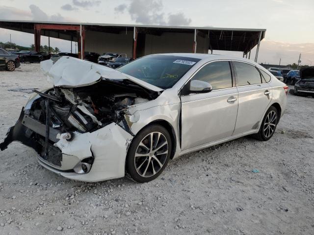TOYOTA AVALON BAS 2013 with VIN 4T1BK1EB4DU037999 - Photo from auction