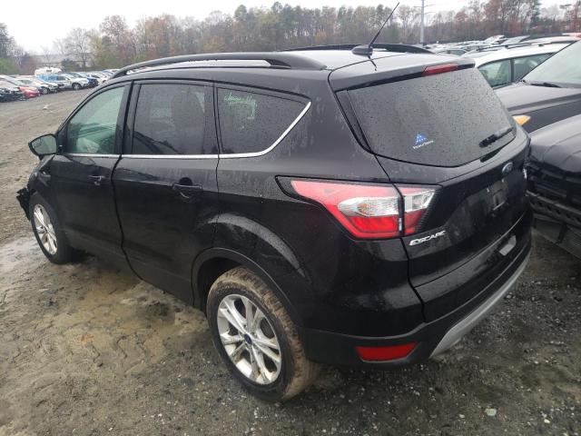 Photo 2 from auction – 2018 FORD ESCAPE SE with VIN 1FMCU9GD6JUB68357