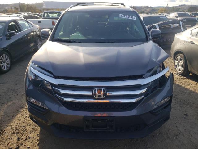 Photo 5 from auction – 2018 HONDA PILOT EXL with VIN 5FNYF5H63JB001847