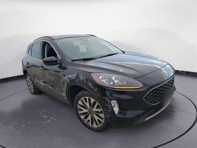 Photo 4 from auction – 2021 FORD ESCAPE TIT with VIN 1FMCU9J96MUA57817