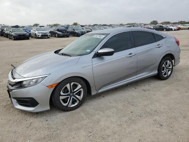 HONDA CIVIC LX 2018 with VIN 2HGFC2F59JH562428 - Photo from auction