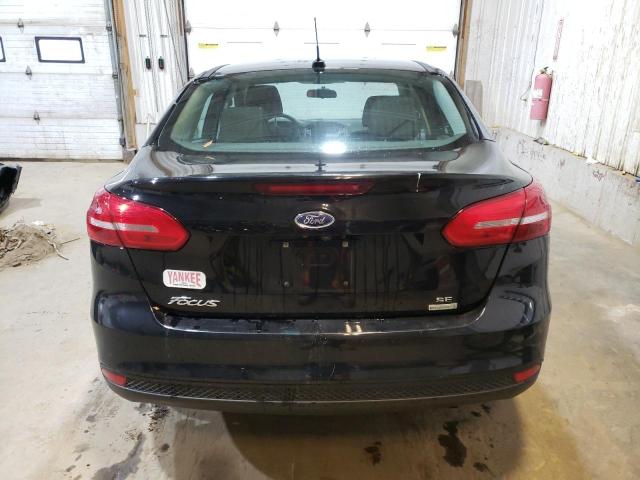Photo 6 from auction – 2018 FORD FOCUS SE with VIN 1FADP3FEXJL329196