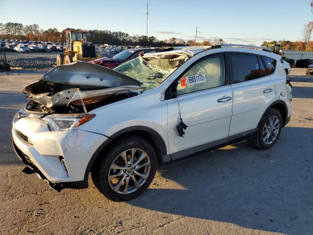 TOYOTA RAV4 LIMIT 2016 with VIN JTMYFREV7GD088669 - Photo from auction