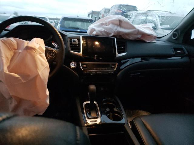 Photo 8 from auction – 2018 HONDA RIDGELINE with VIN 5FPYK3F70JB013991