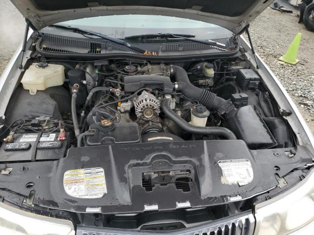 Photo 11 from auction – 1999 LINCOLN TOWN CAR E with VIN 1LNHM81W5XY665587