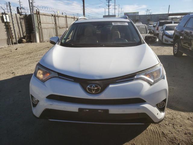 Photo 5 from auction – 2017 TOYOTA RAV4 XLE with VIN JTMRFREV4HJ135132