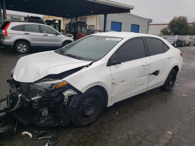TOYOTA COROLLA L 2017 with VIN 5YFBURHE4HP670394 - Photo from auction
